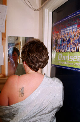  Sandra Ditch, 39 Chelsea fan, I've been going down there for 23 years. Dad was born in Chelsea and all the boys were supporters. I came home from Germany one day and one of my brothers asked me if I wanted to go along to a game with him. That was it, I was hooked. I had my tattoo done in 1997 when we won the cup. I don't like pain so I never thought I'd have one done but then my brother got one and said they had a really nice Chelsea one. He came with me whilst I had mine done. If I ever had another tattoo I'd have an England one underneath.