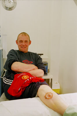  Andy Whyte, 38, Manchester United fan,I think I'm going through the male menopause! I'd been meaning to get them done for ages and just never got around to it. With the World Cup coming up and with St George's Day just been I decided to get them done today. They'll never go out of fashion. I wanted my legs done because I've already got the top of my arms done and I thought it'd add a bit of colour to them. I'm from Manchester and have always supported United