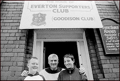 Joseph, James, and Ryan in front of the Everton Supporters' Club founded in 1958 is the oldest in the country